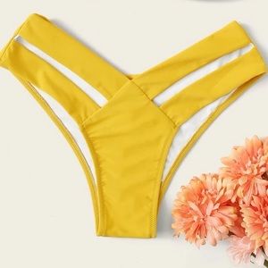 Yellow cut-out bathing suit bottoms